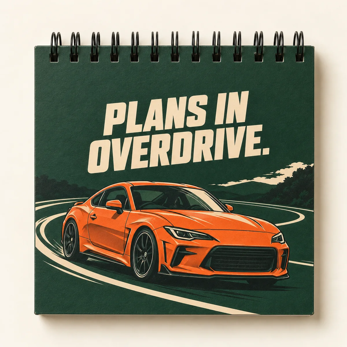 Concept mockup of Plans in Overdrive, a square diary with top spiral binding